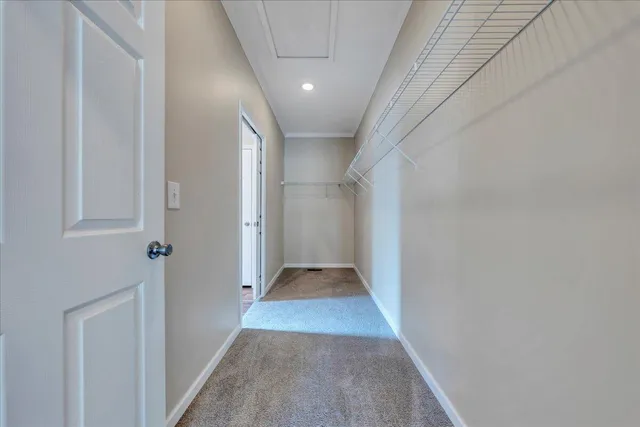 a view of a balcony with wooden floor