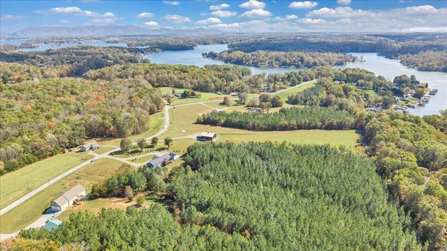 a view of a swimming pool with seating area