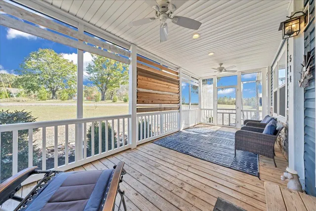a living room with large windows