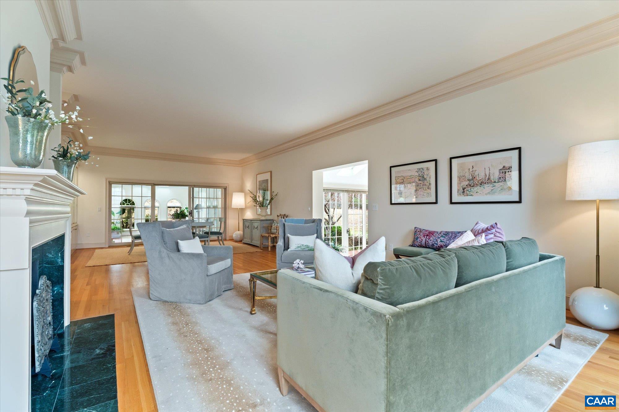 1462 Owensville Road Charlottesville, VA 22901 - Photo 12 of 56 a living room with furniture and a fireplace