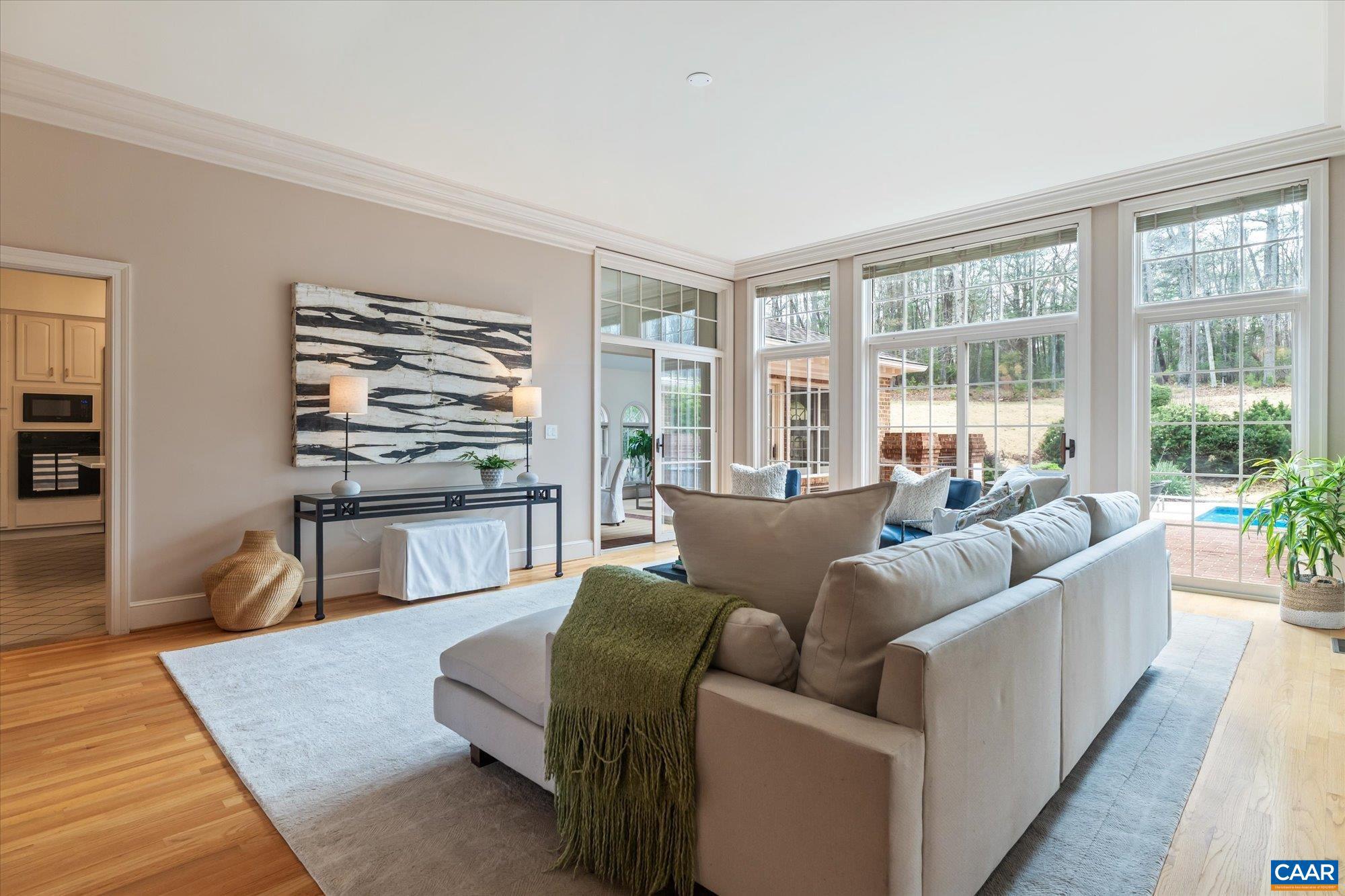 1462 Owensville Road Charlottesville, VA 22901 - Photo 17 of 56 a living room with furniture and a large window