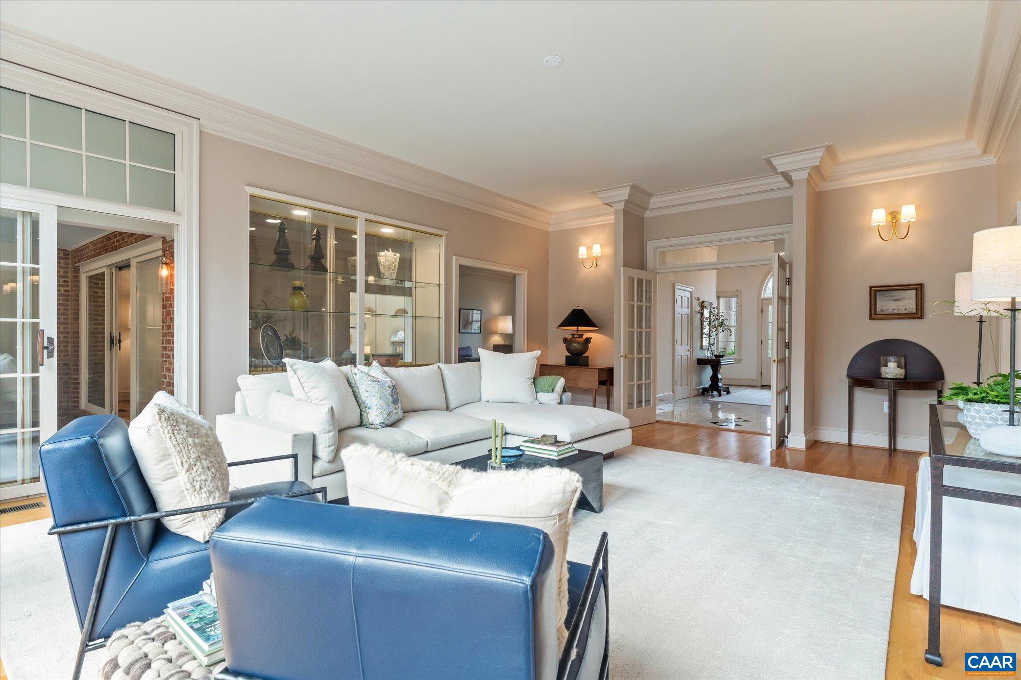 1462 Owensville Road Charlottesville, VA 22901 - Photo 18 of 56 a living room with furniture a lamp and large window