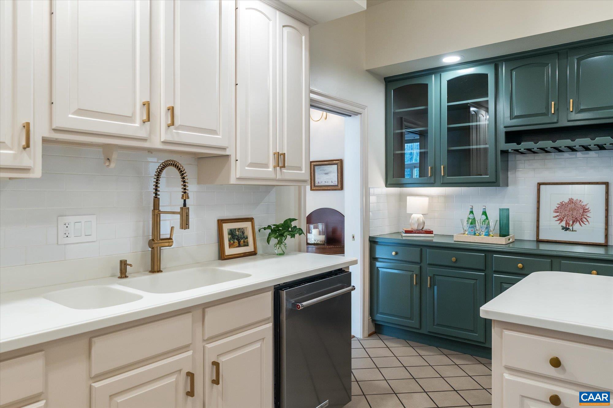 1462 Owensville Road Charlottesville, VA 22901 - Photo 22 of 56 a kitchen with stainless steel appliances granite countertop a sink and cabinets