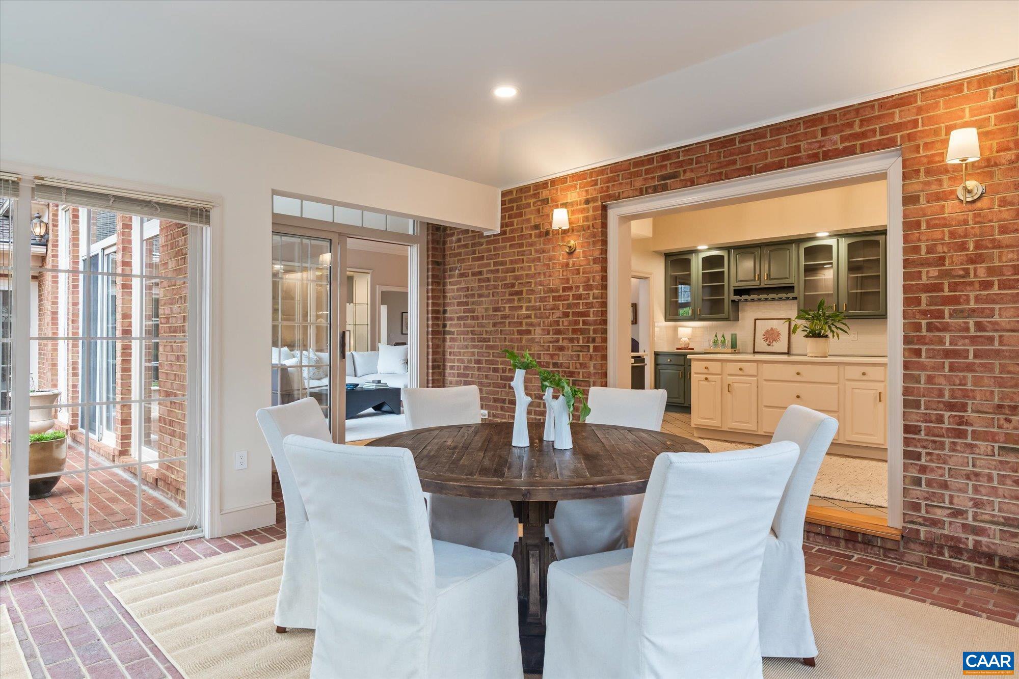 1462 Owensville Road Charlottesville, VA 22901 - Photo 23 of 56 a dining room with furniture and wooden floor