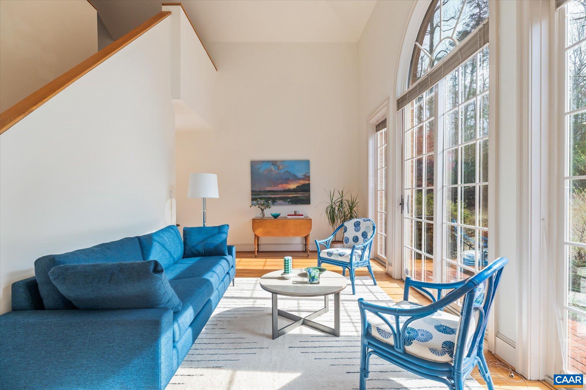 1462 Owensville Road Charlottesville, VA 22901 - Photo 33 of 56 a living room with furniture and a flat screen tv
