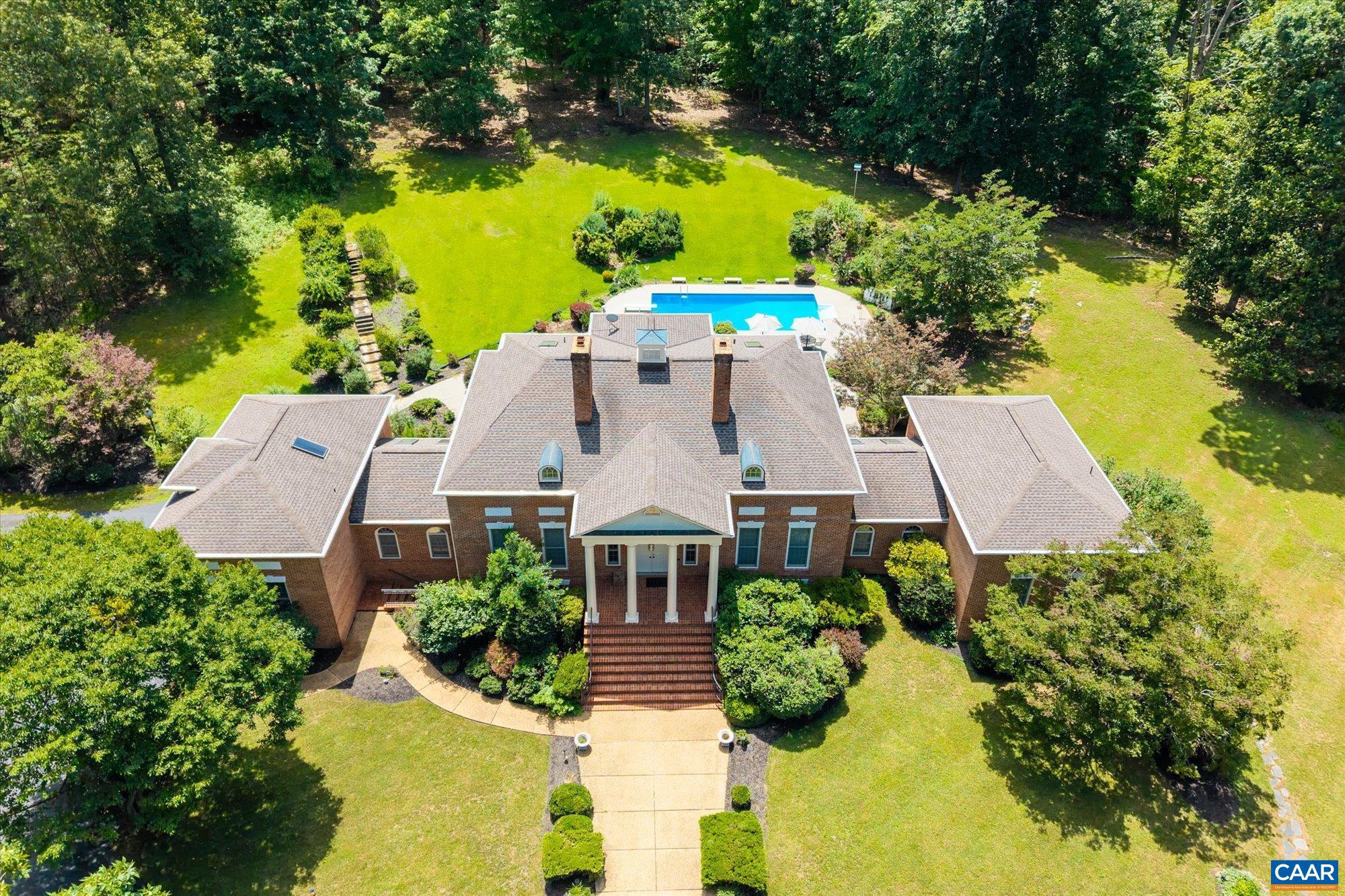 1462 Owensville Road Charlottesville, VA 22901 - Photo 4 of 56 an aerial view of a house with swimming pool and garden