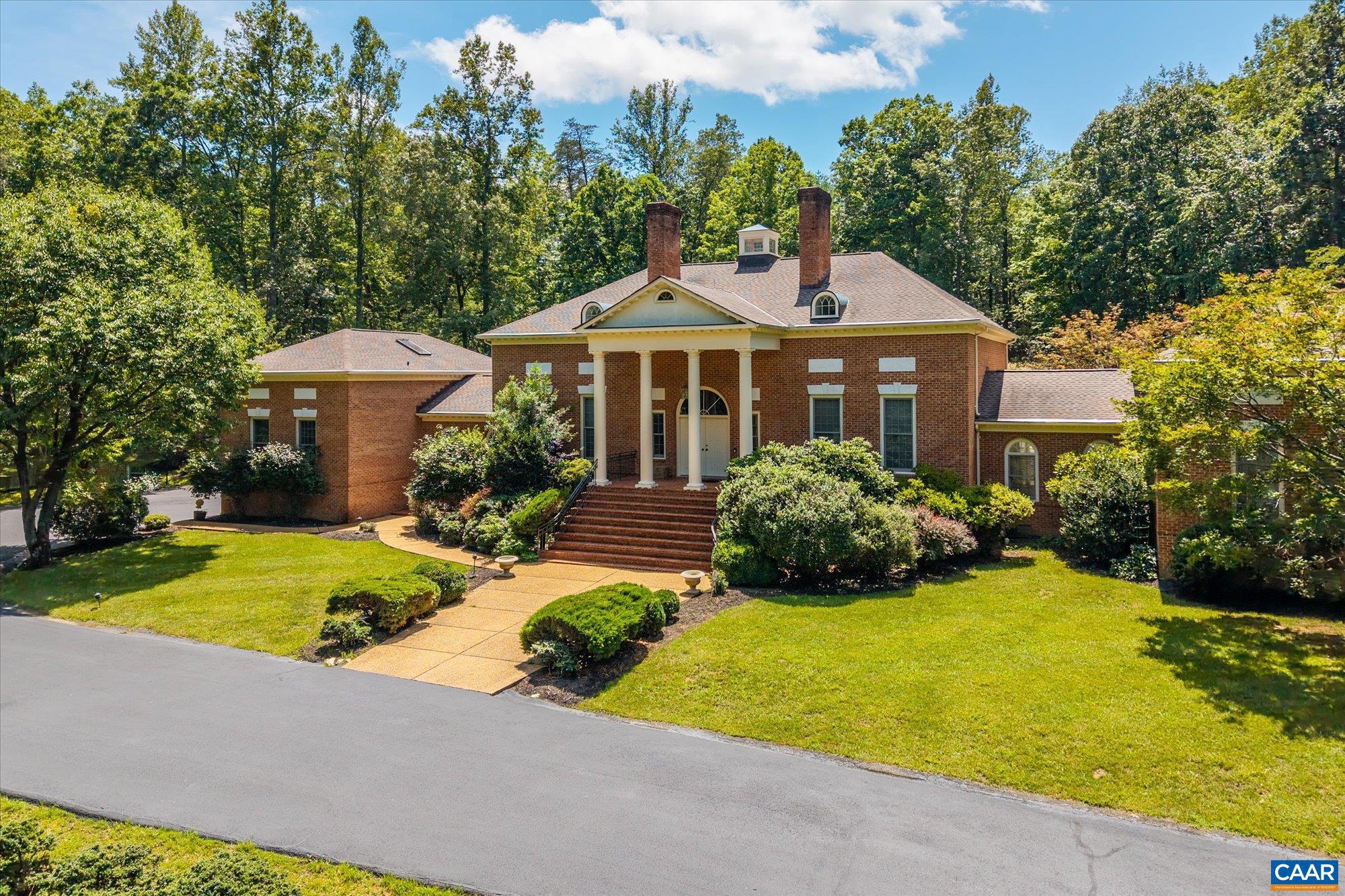 1462 Owensville Road Charlottesville, VA 22901 - Photo 55 of 56 a front view of a house with yard and green space