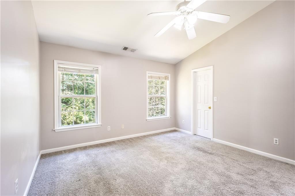 1545 Anna Ruby Lane Kennesaw, GA 30152 - Photo 18 of 45 a view of an empty room with a window