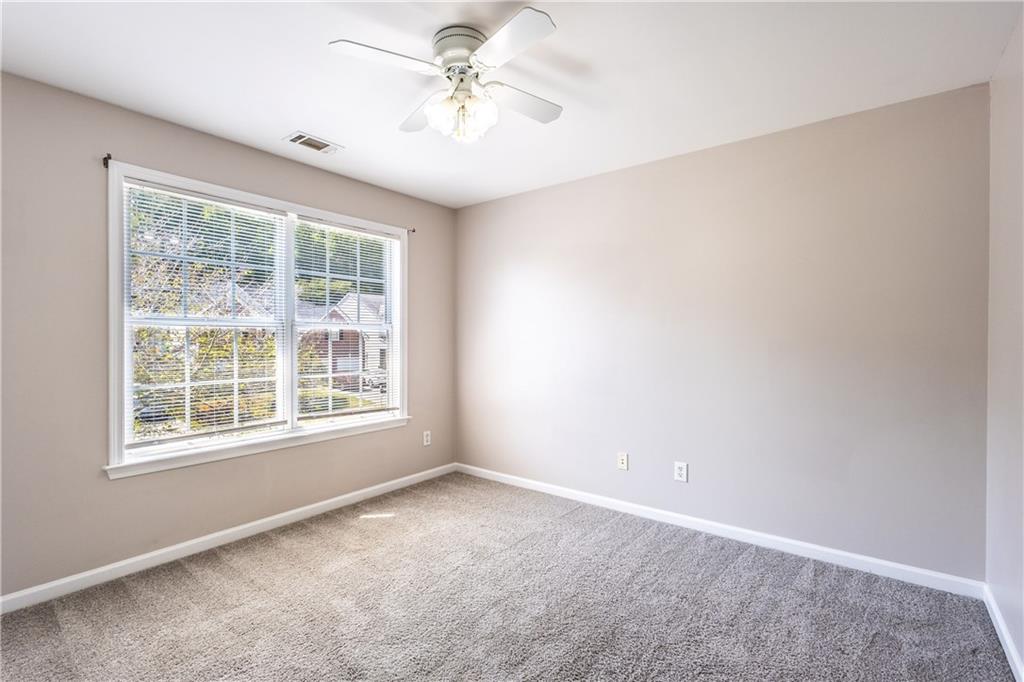 1545 Anna Ruby Lane Kennesaw, GA 30152 - Photo 33 of 45 an empty room with a window