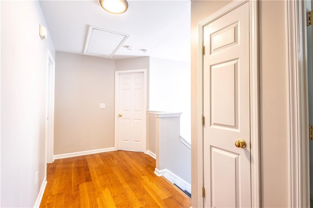 1545 Anna Ruby Lane Kennesaw, GA 30152 - Photo 36 of 45 a view of a bedroom with a bed and a window