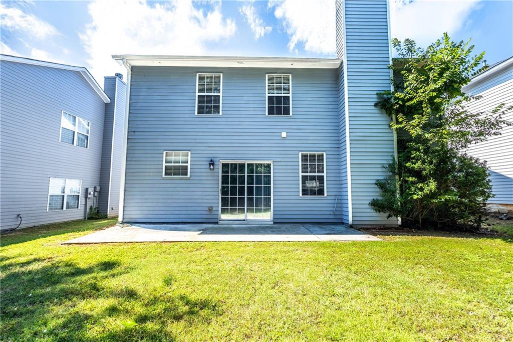 1545 Anna Ruby Lane Kennesaw, GA 30152 - Photo 38 of 45 a view of a house with a yard