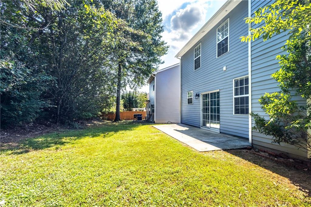 1545 Anna Ruby Lane Kennesaw, GA 30152 - Photo 40 of 45 a view of a house with swimming pool