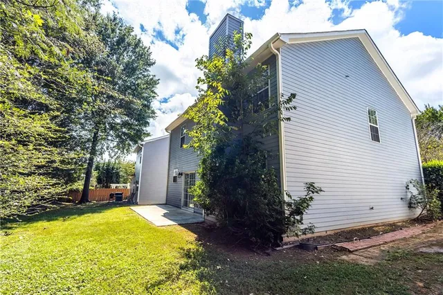a view of swimming pool with a backyard