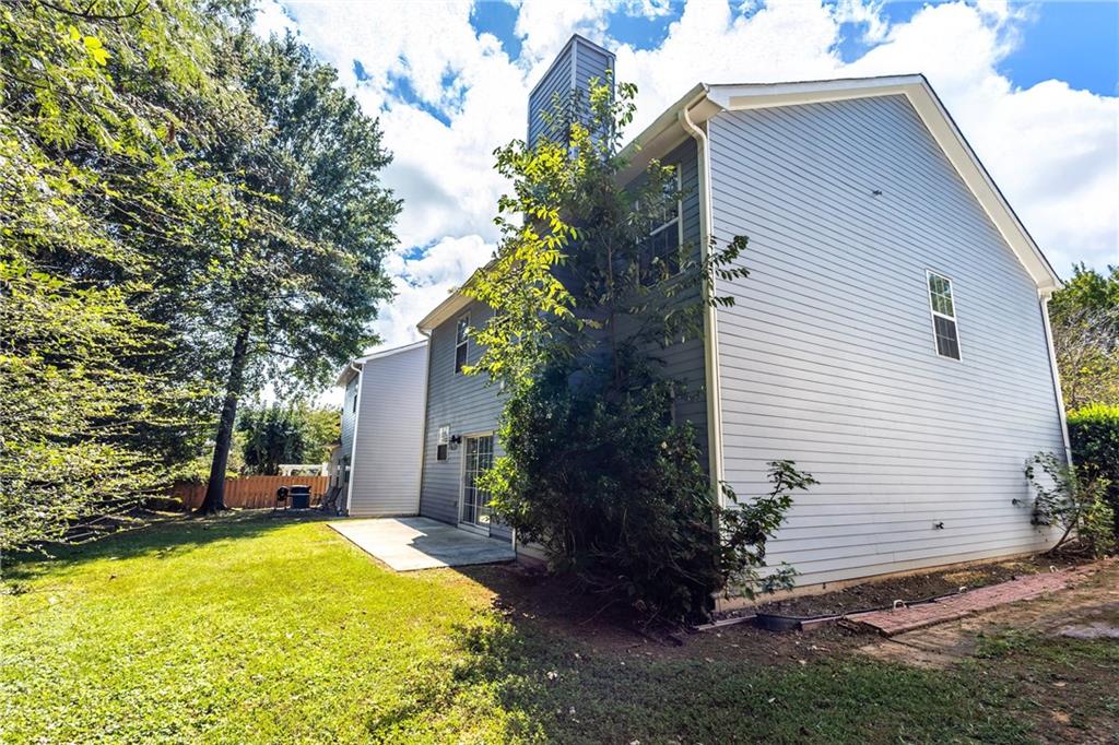 1545 Anna Ruby Lane Kennesaw, GA 30152 - Photo 41 of 45 a view of swimming pool with a backyard