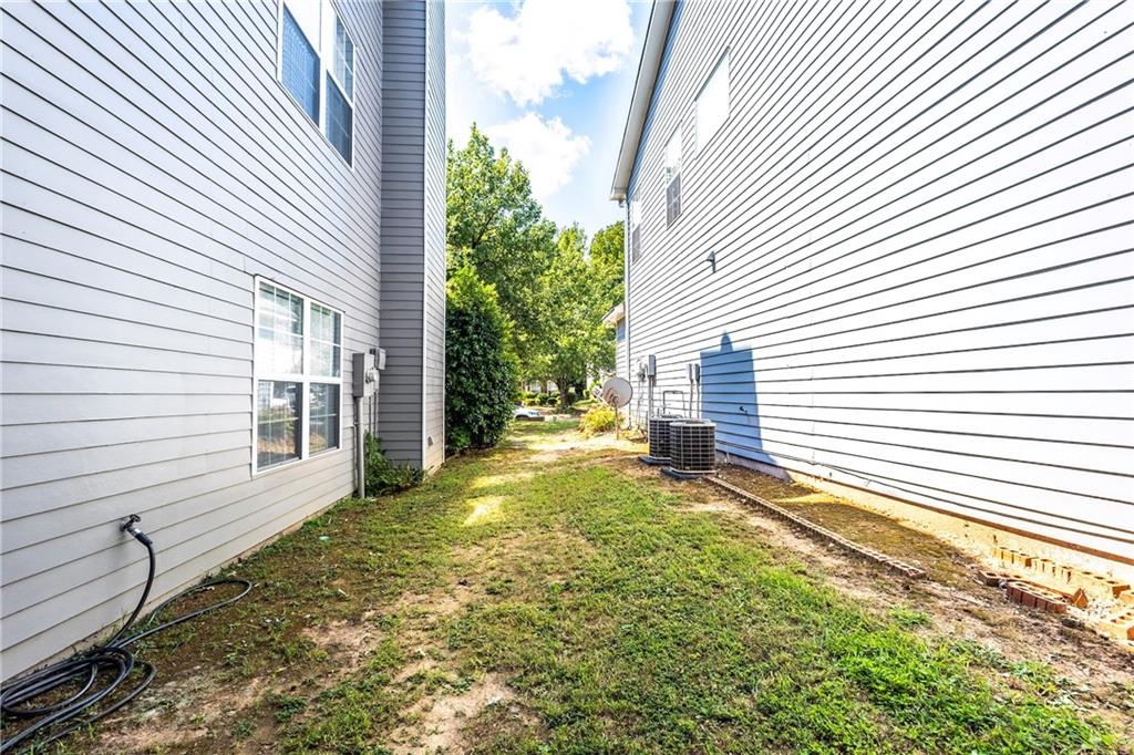 1545 Anna Ruby Lane Kennesaw, GA 30152 - Photo 42 of 45 a view of a backyard with a garden