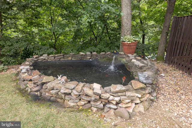 a view of an empty room and a window