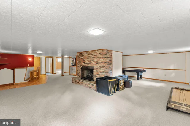 a bathroom with a sink toilet and mirror