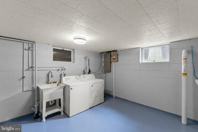 a view of house with yard and entertaining space