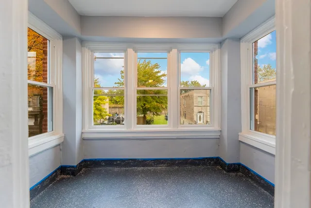 an empty room with windows