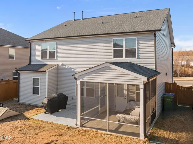 a front view of a house with yard