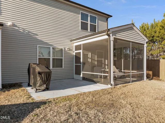 a front view of a house with glass windows
