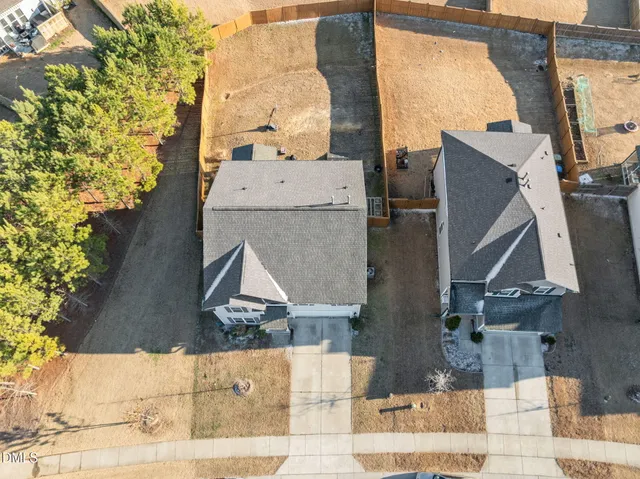 a front view of a house with yard