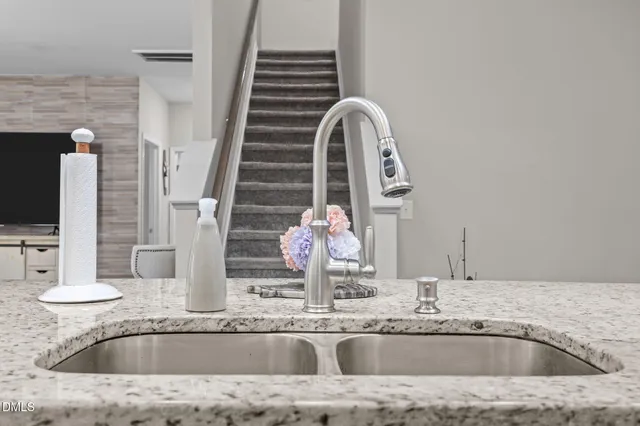 a kitchen with a stove and a microwave