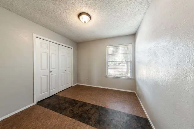 an empty room with windows