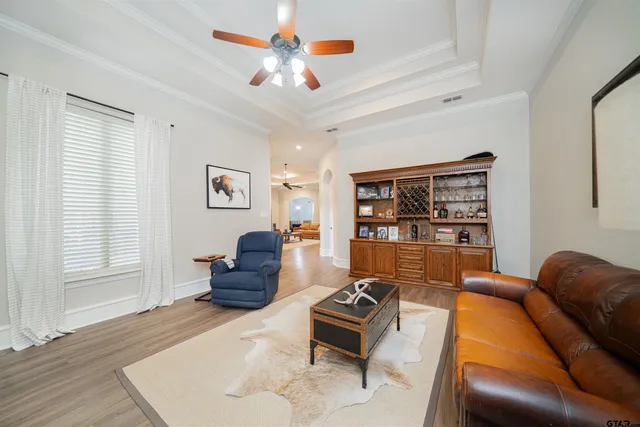 a living room with furniture and a window