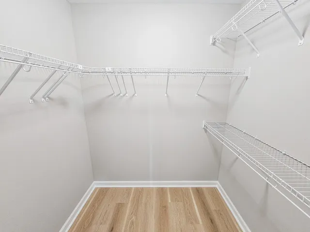 a view of a room with racks on the wall