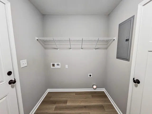 a view of a room with racks on the wall