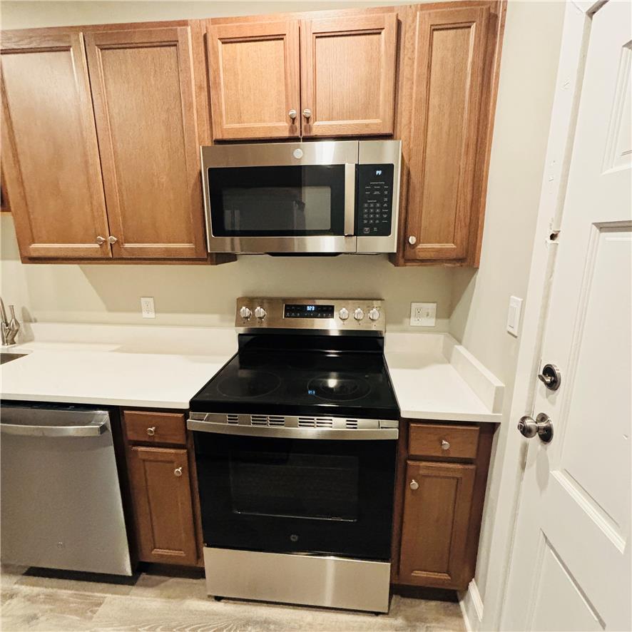 718 Linden Street Bethlehem, PA 18018 - Photo 5 of 19 Modern kitchen with stainless steel appliances and ample counter space.