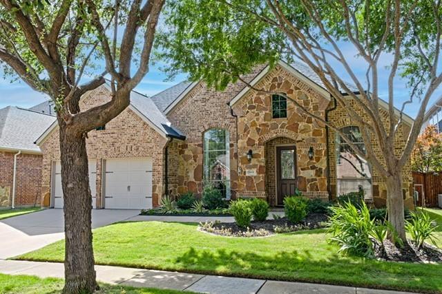 8160 Holliday Road Lantana, TX 76226 - Photo 1 of 39 As charming on the inside as seen from the street. Well manicured lawn with popular stone and brick elevationl