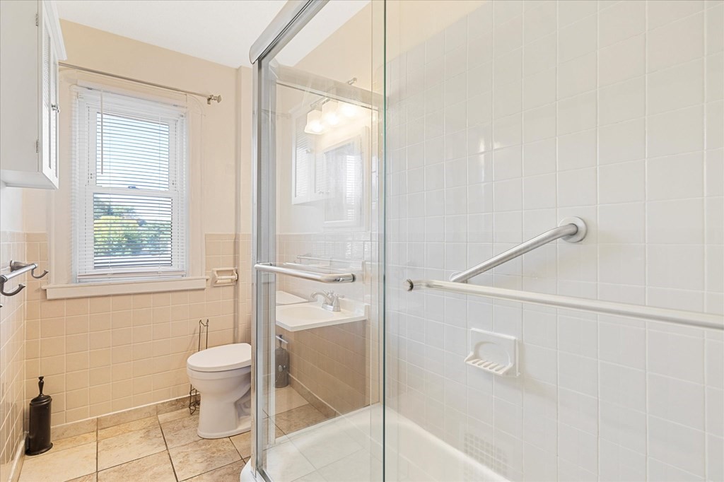 278 Plumtree Road Springfield, MA 01118 - Photo 17 of 26 a bathroom with a toilet and a shower