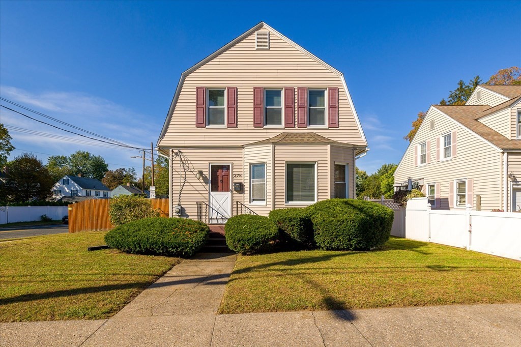 278 Plumtree Road Springfield, MA 01118 - Photo 2 of 26 a front view of a house with a yard