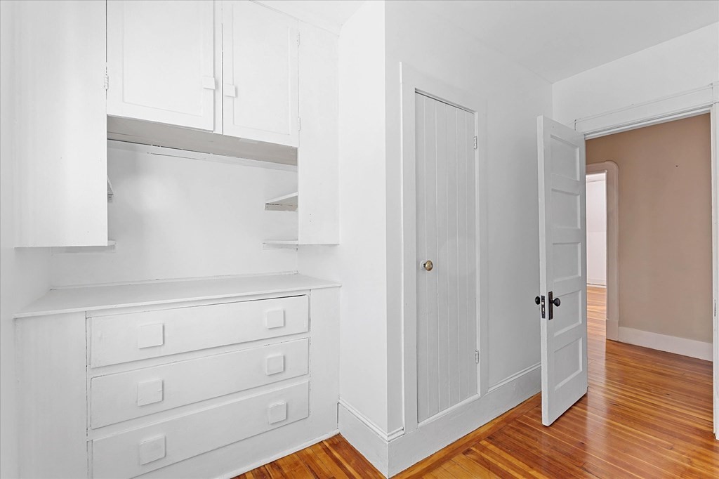 278 Plumtree Road Springfield, MA 01118 - Photo 21 of 26 a view of a closet area with hardwood floor
