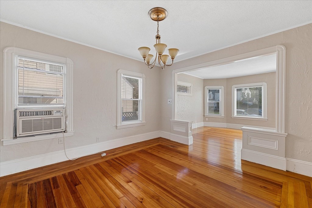 278 Plumtree Road Springfield, MA 01118 - Photo 7 of 26 a view of empty room with wooden floor and fan
