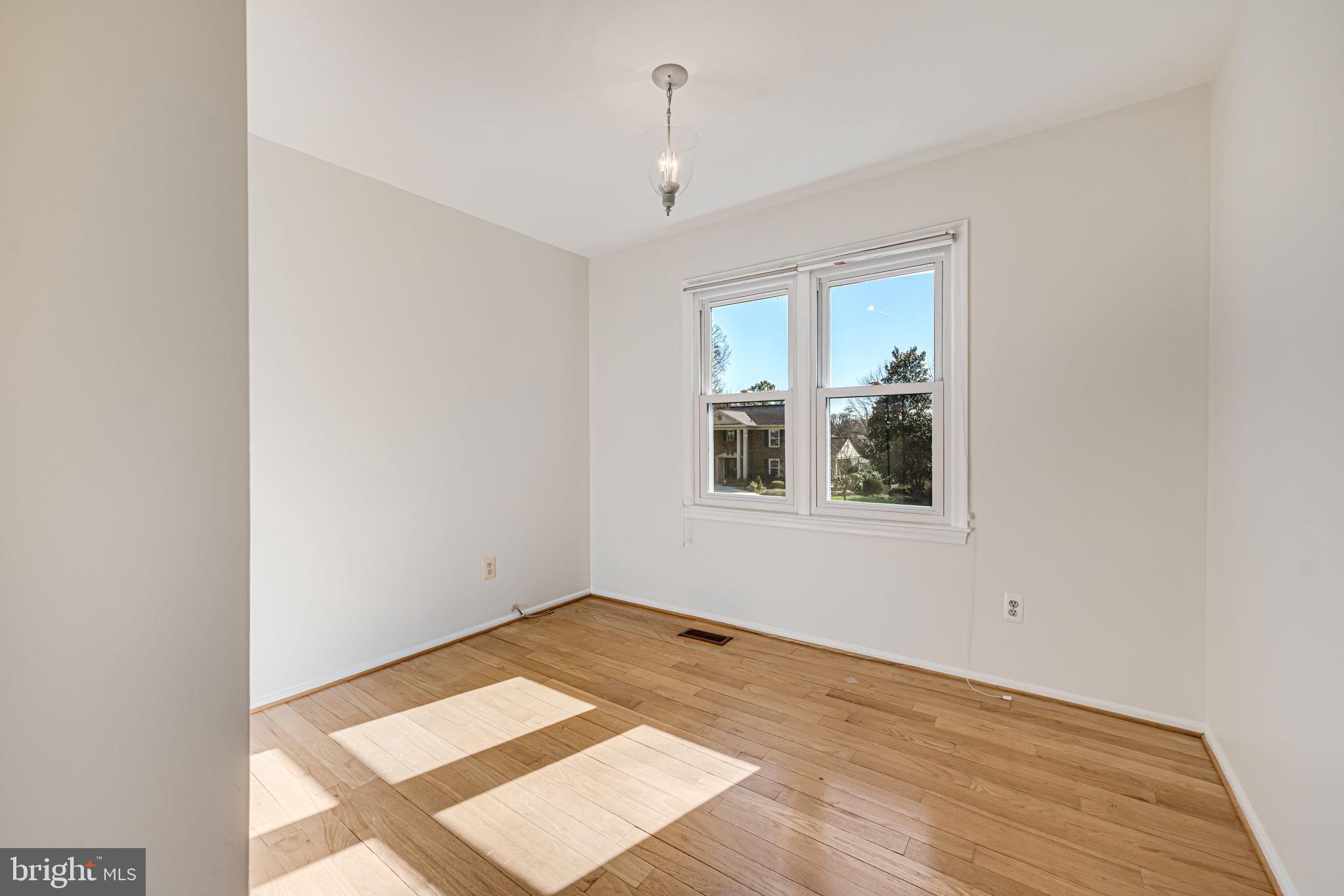 1831 Quartet Circle Vienna, VA 22182 - Photo 34 of 60 a view of an empty room with a window