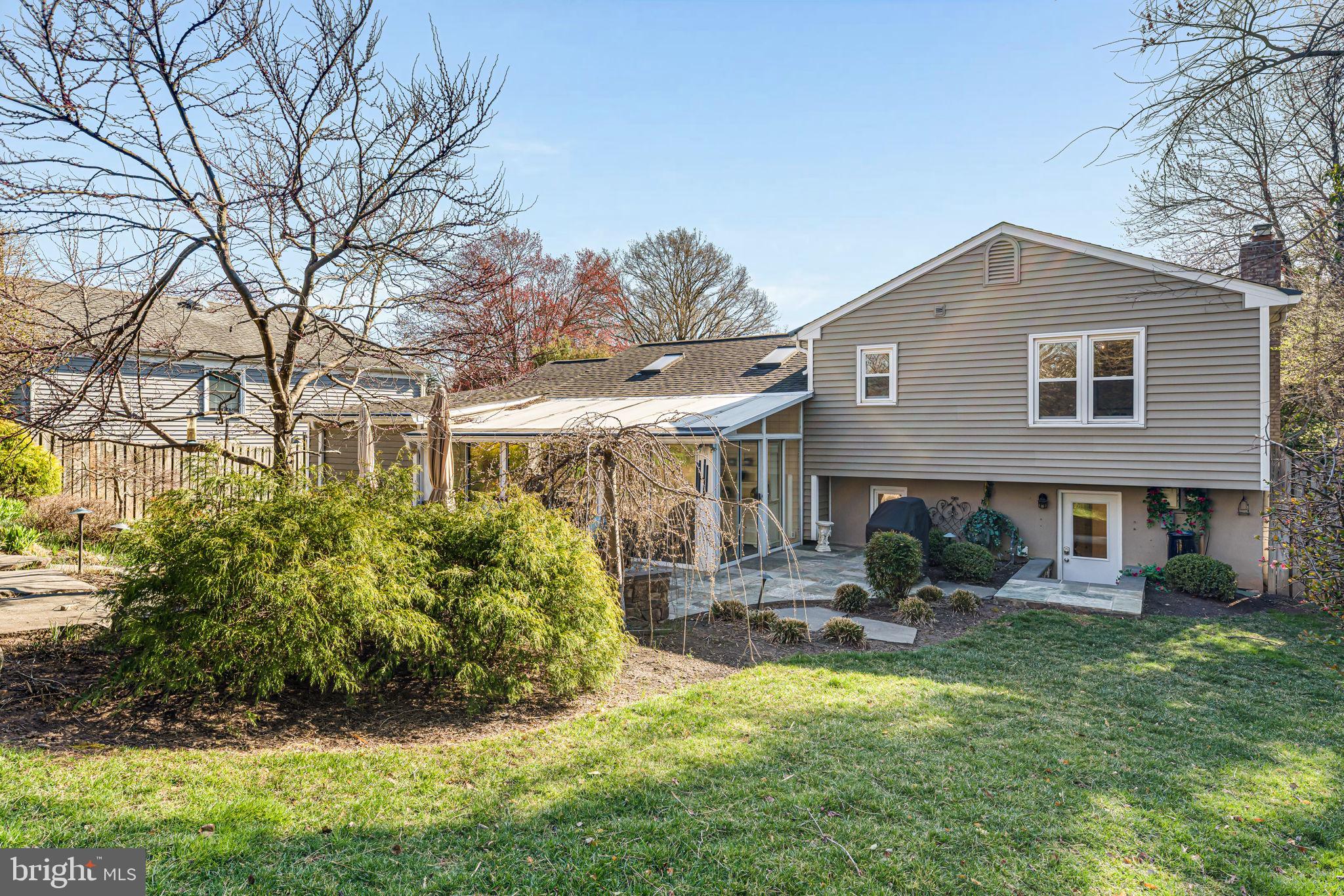 1831 Quartet Circle Vienna, VA 22182 - Photo 38 of 60 a front view of a house with yard and green space
