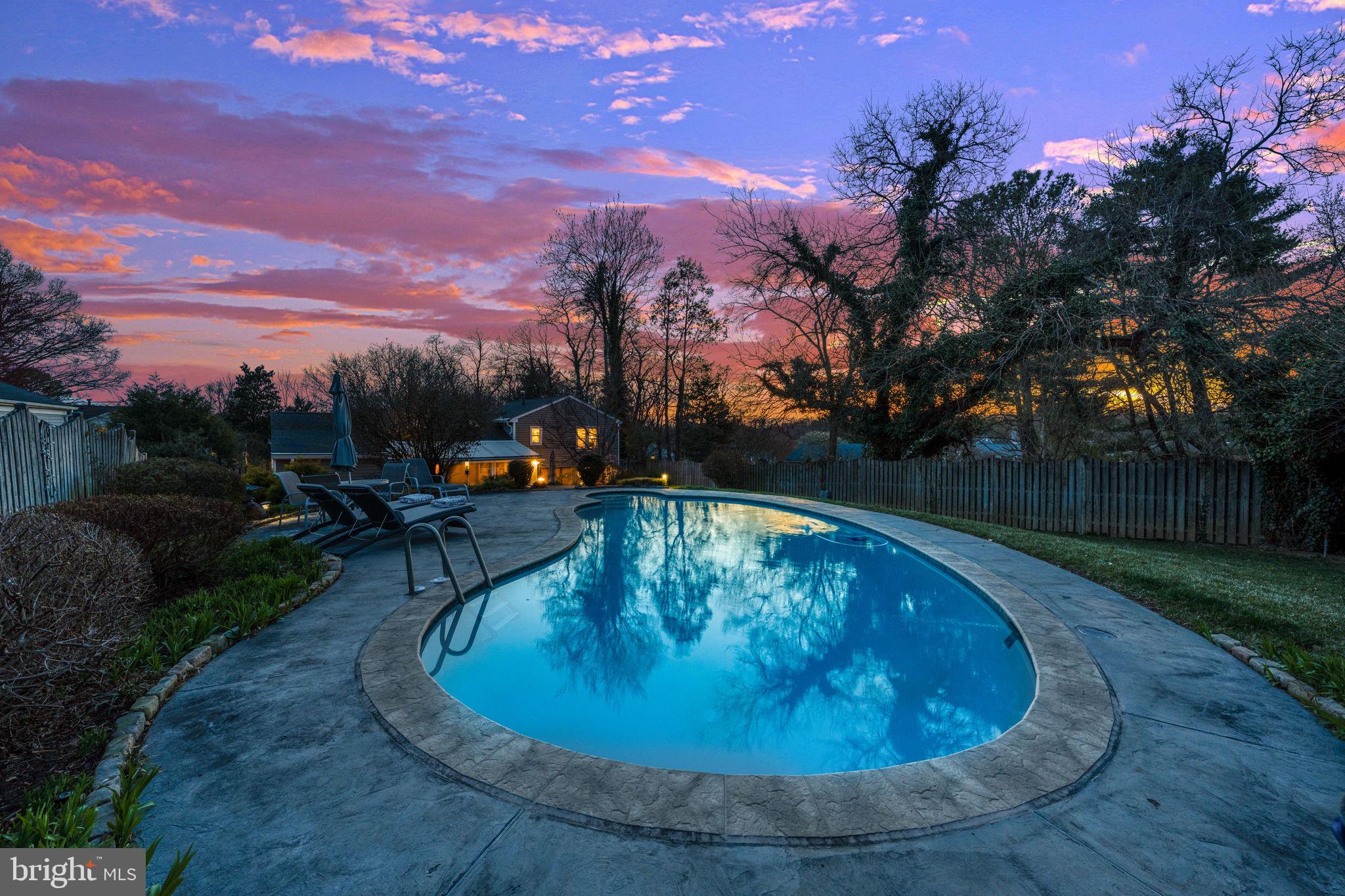 1831 Quartet Circle Vienna, VA 22182 - Photo 51 of 60 a view of a swimming pool with a yard