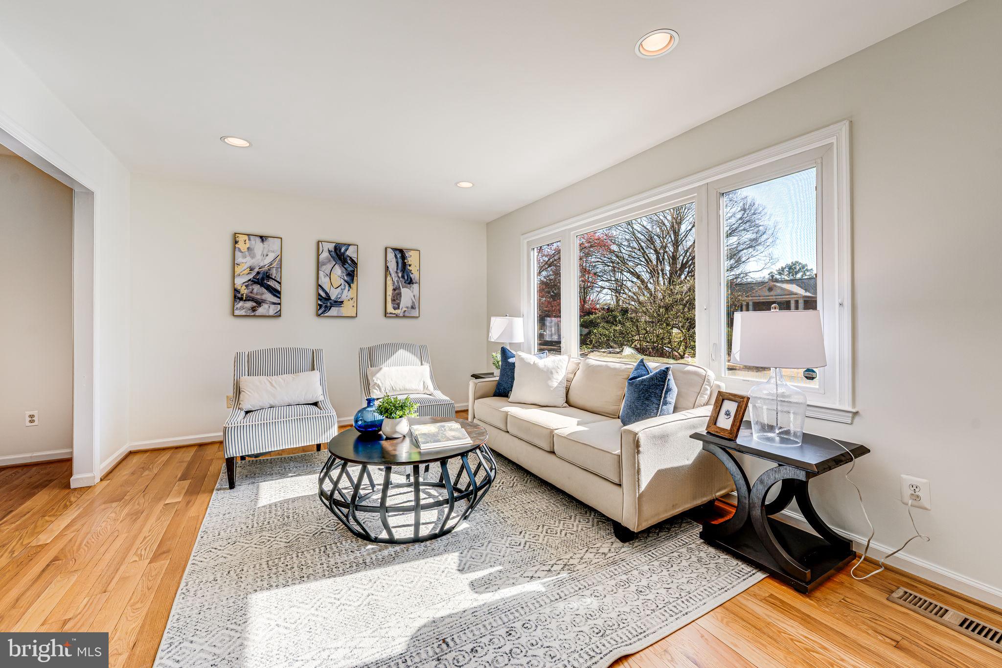 1831 Quartet Circle Vienna, VA 22182 - Photo 6 of 60 a living room with furniture and a large window