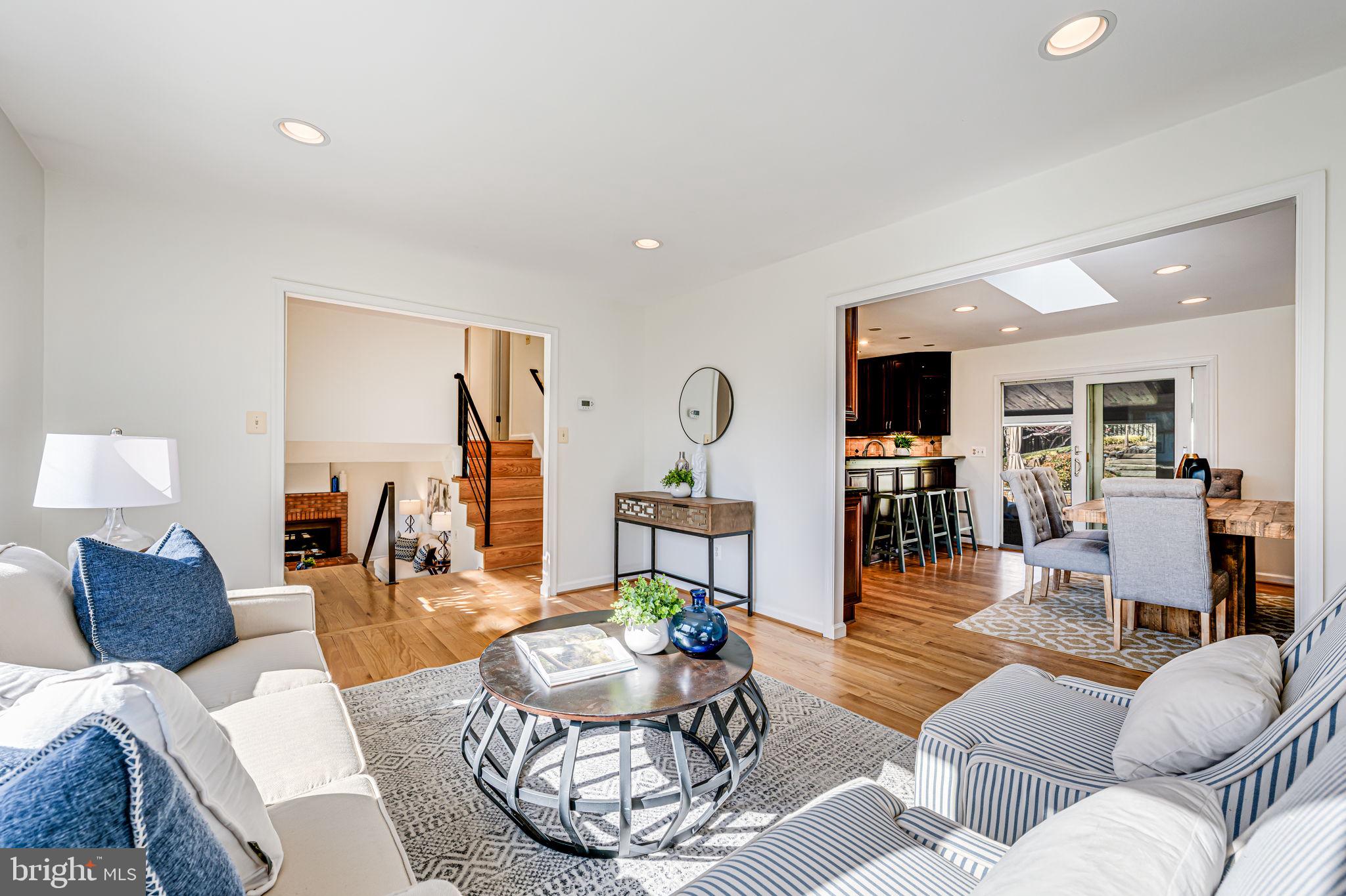 1831 Quartet Circle Vienna, VA 22182 - Photo 10 of 60 a living room with furniture and wooden floor