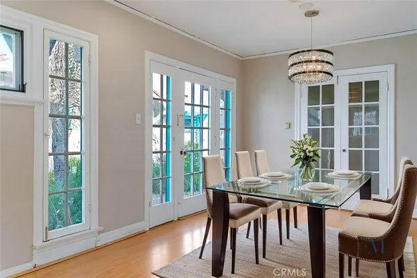 a dining room with furniture window wooden floor