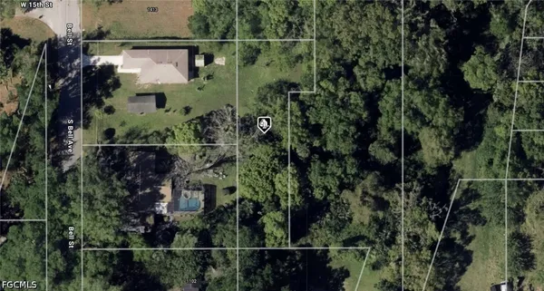an aerial view of houses and roads