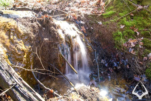 a view of balcony with wooden floor and fence