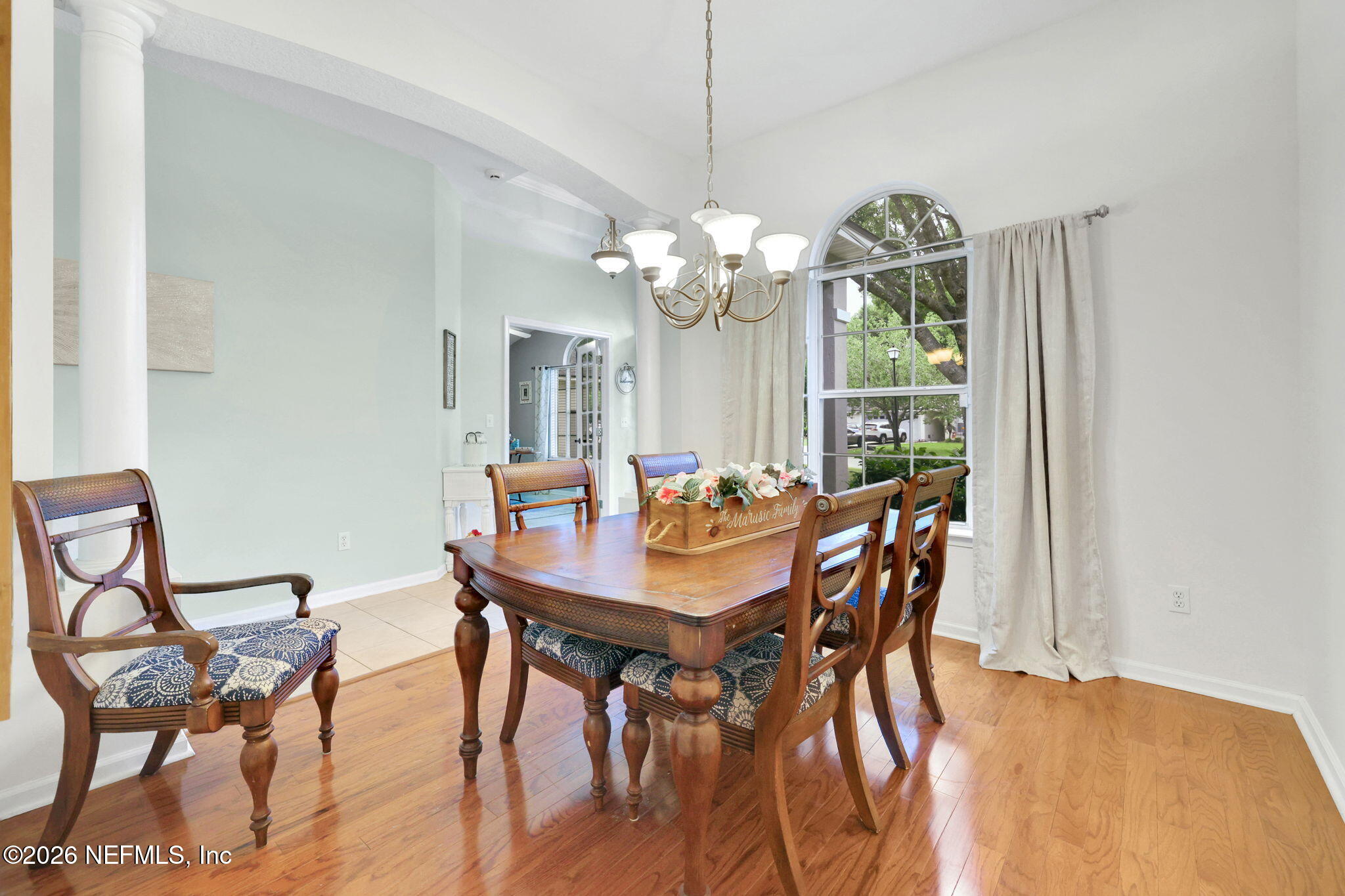 4320 Rye Court St. Johns, FL 32259 - Photo 9 of 60 a view of a dining room with furniture and a chandelier