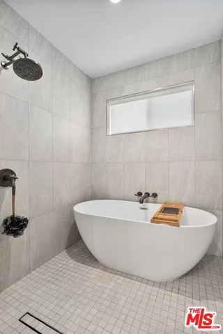 a bathroom with a sink and a bathtub