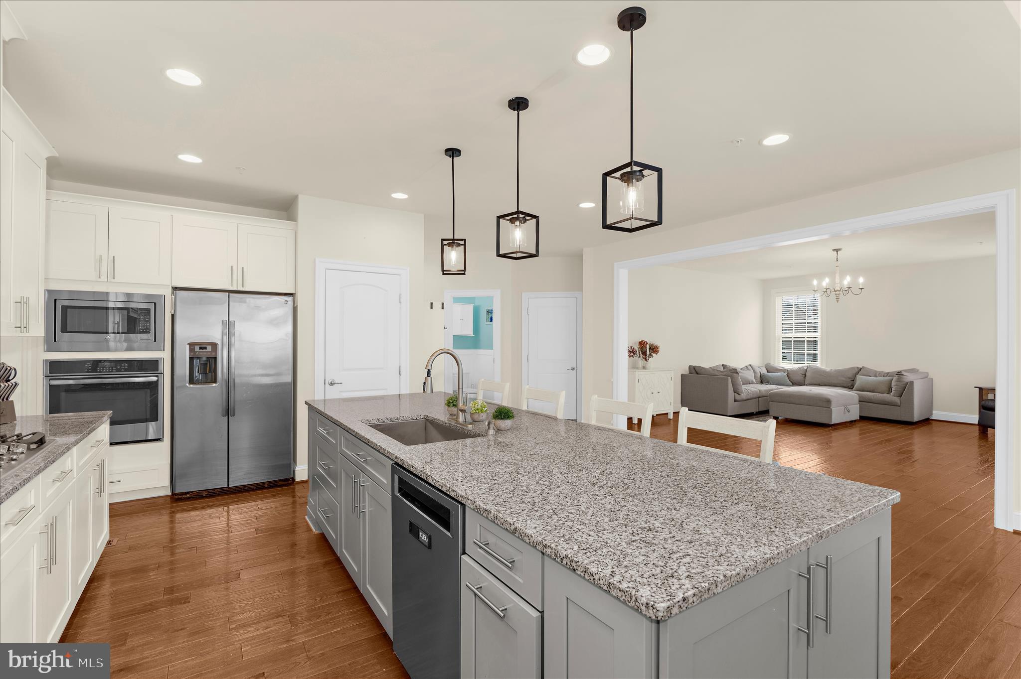 830 Sebastian Lane Gambrills, MD 21054 - Photo 15 of 63 a kitchen with stainless steel appliances granite countertop counter space a sink and refrigerator
