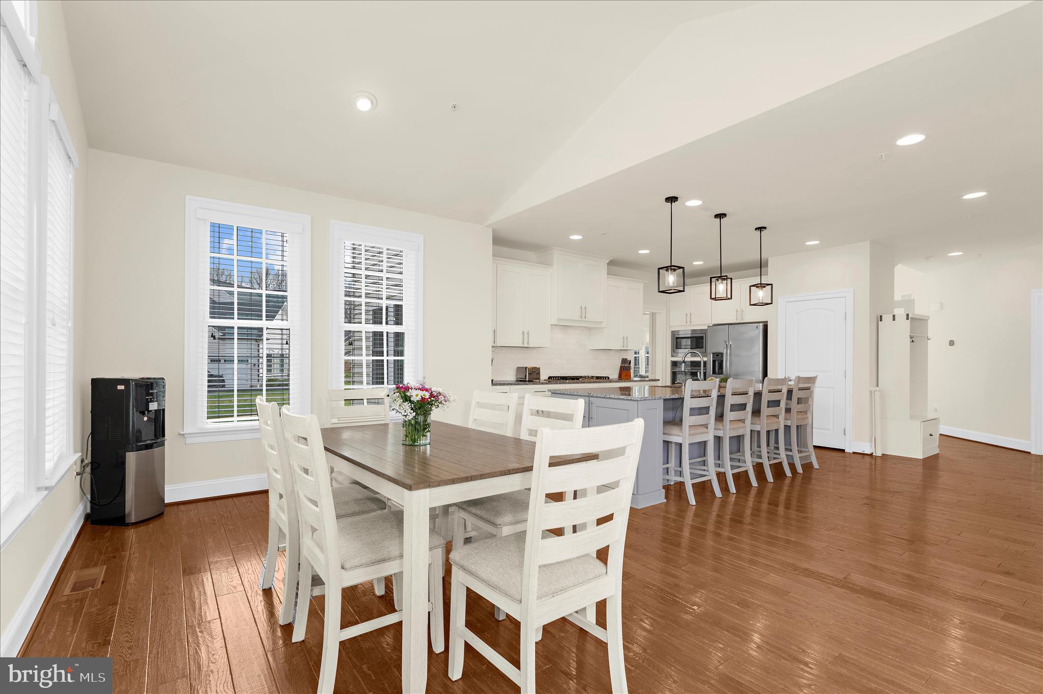 830 Sebastian Lane Gambrills, MD 21054 - Photo 16 of 63 a dining room with furniture and wooden floor