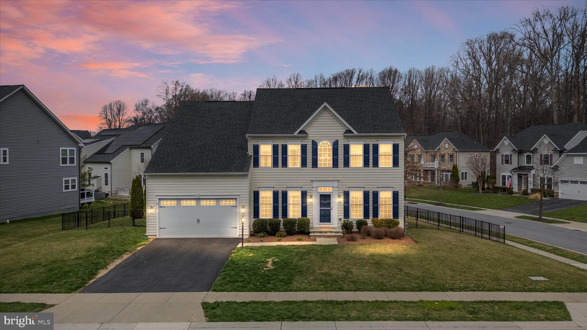 830 Sebastian Lane Gambrills, MD 21054 - Photo 2 of 63 front view of house with a yard